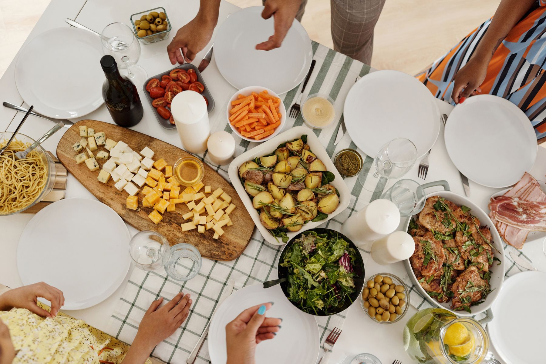 A table set with shared dishes, seen from above